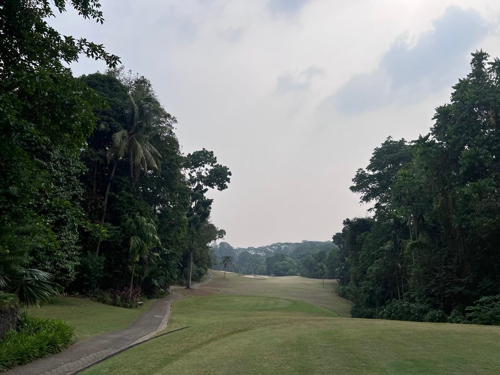Tree-lined golf hole at Jagorawi Golf & Country Club
